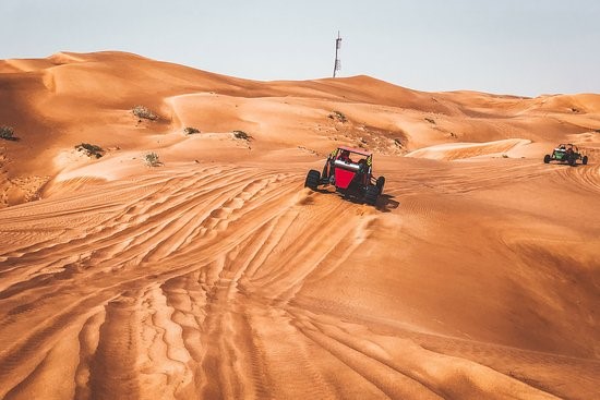 An unforgettable time riding through the red sand dunes of Dubai on Honeymoon package by Roaming Routes 